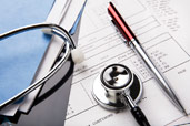 stethoscope and paperwork image