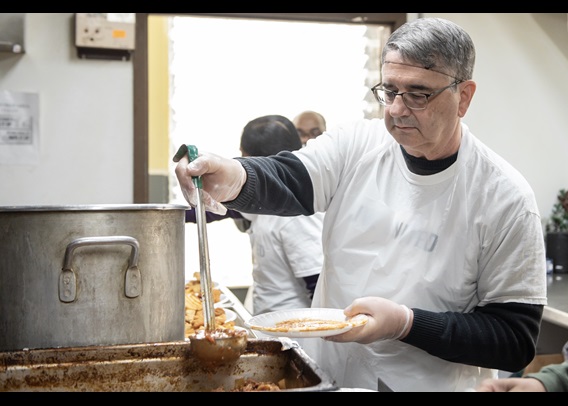 Detroit Branch employee shown volunteering serving food