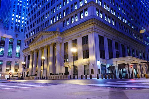 Chicago Fed building at night, front view