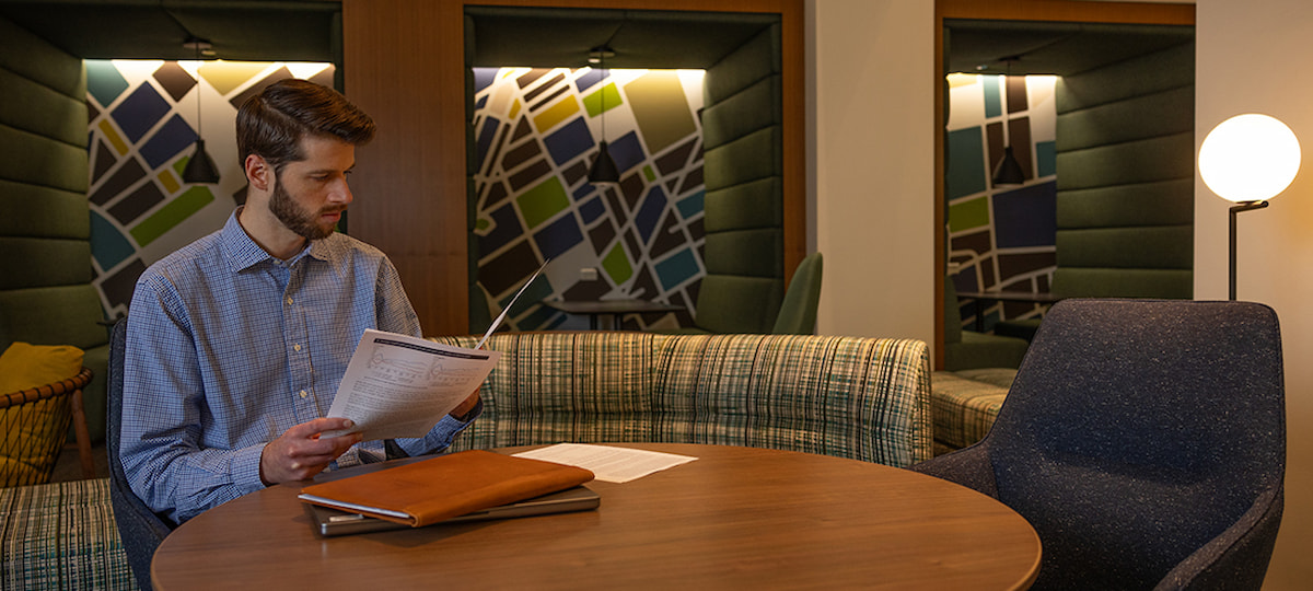 man reading an article